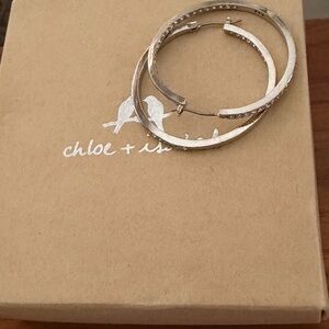 Chloe + Isabel Silver Tone Hoop Earrings
Stones on inside. Beautiful!
B2
